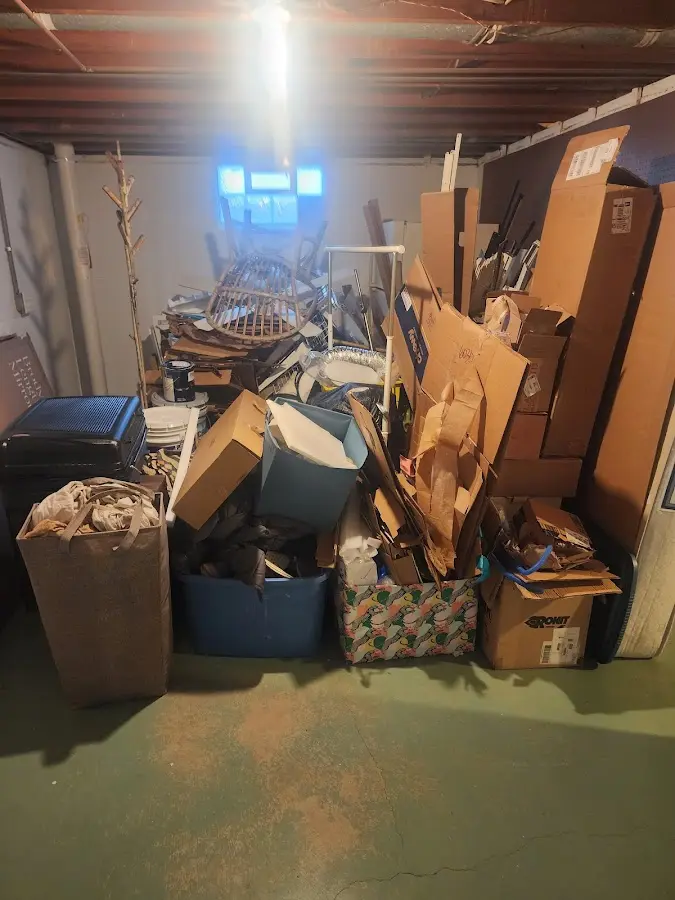 Roll-off dumpster container at job site for Yard Waste Dumpster Rental in Buena